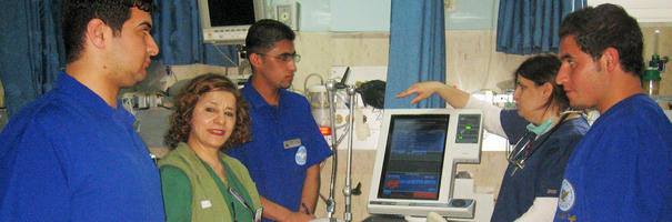 Student nurses learning how to operate medical technology